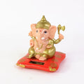 Solar-powered Lord Ganesha idol for car dashboard and home decor - photo 1