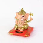 Solar-powered Lord Ganesha idol for car dashboard and home decor - photo 1